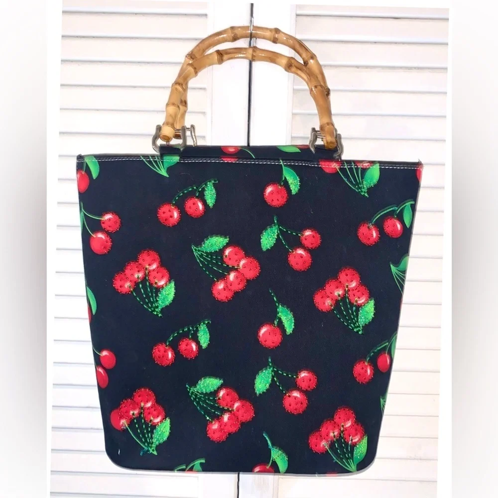 Black purse with red cherries and bamboo handles large